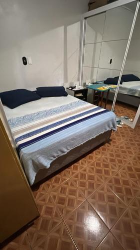 Postel nebo postele na pokoji v ubytování Casa de Família