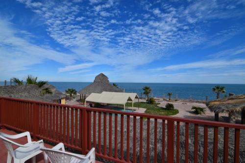 a deck with chairs and a view of the ocean at Little Slice of Heaven - Amazing San Felipe Beach Rental in Don Pancho