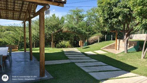 Ein Garten an der Unterkunft Casa PWG Cânions - Sua casa de temporada no paraíso