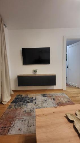 TV/trung tâm giải trí tại DivčiNova Luna