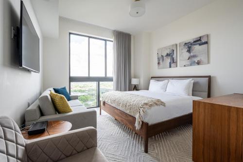 En eller flere senge i et værelse på Skyline Haven