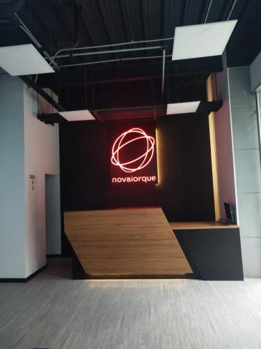 a sign on a wall with a basketball sign on it at Nova Iorque Suites by Avia Suites in Bogotá