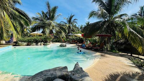 Bazén v ubytování Casa Las Palmas Playa La Saladita nebo v jeho okolí