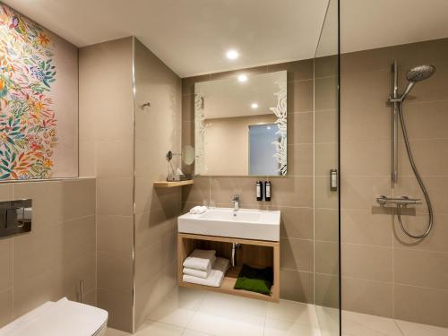 Koupelna v ubytování Mövenpick Hotel Stuttgart Messe & Congress