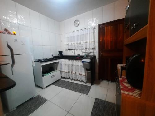 Kuchyň nebo kuchyňský kout v ubytování Aconchego de vó