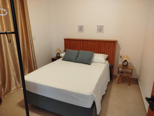 En eller flere senge i et værelse på Serra Negra SP Quintas do Poente Casa 2