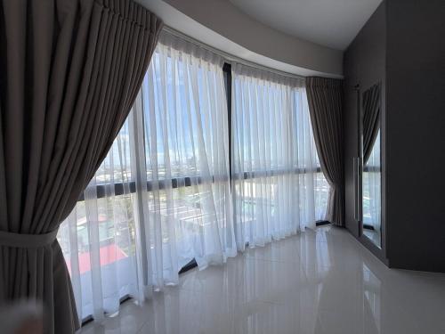 Φωτογραφία από το άλμπουμ του Cozy 1-BR Condo Unit σε Mandaue City