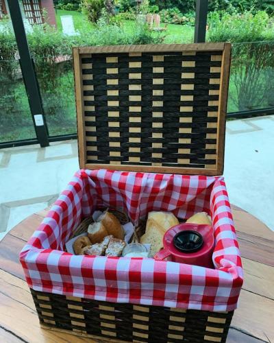 Posezení v ubytování Le Ville - Campos do Jordão