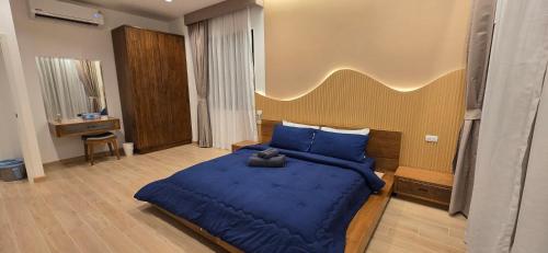 Postel nebo postele na pokoji v ubytování Goldena Residence Pool Villas