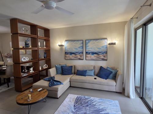 Chic poolside haven 3BR steps from the beach