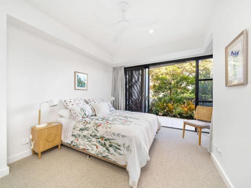 Postel nebo postele na pokoji v ubytování Sunrises and Sandy Toes