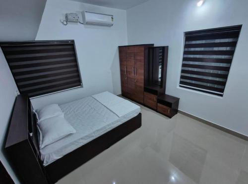 Ένα ή περισσότερα κρεβάτια σε δωμάτιο στο Munroe La Casa