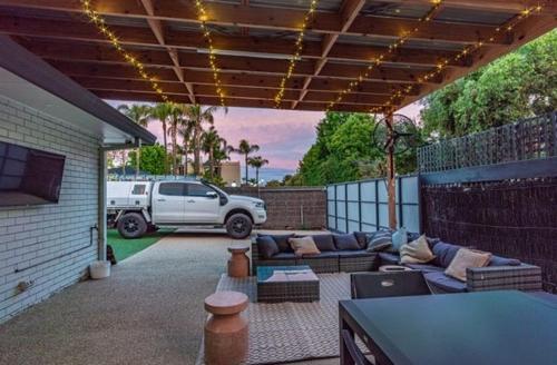 a patio with a truck parked in the back yard at Relax Inn in Mulwala