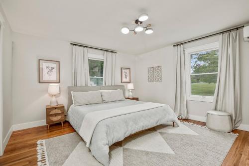 Ένα ή περισσότερα κρεβάτια σε δωμάτιο στο The Homestead at Carter Bridge Estate