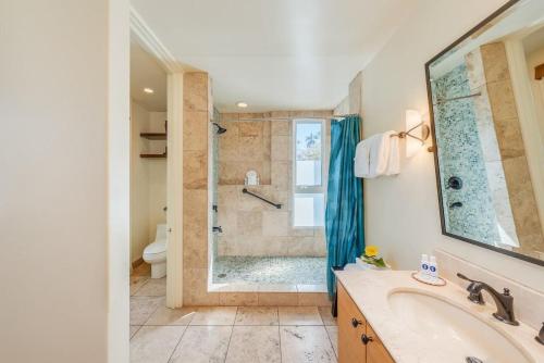 a bathroom with a shower and a sink at Palms at Wailea 2108 · PAW 2108 Remodeled Wailea Condo w AC Infi in Wailea