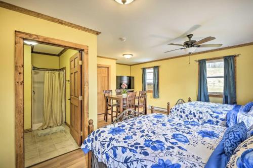 a bedroom with a bed and a dining room at Clydesdale Cottage & Brandenburger Suite at Equestrian House PA in Pleasant Mount