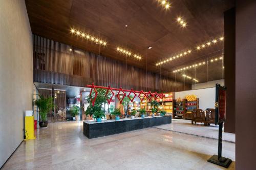 Ảnh trong thư viện ảnh của Zhangjiajie Tianchong Yunhai Hotel-The hotel is about 700 meters away from the east gate of Zhangjiajie National Forest Park local specialty breakfast AttractionTickets Serivce in advance English butler service ở Trương Gia Giới