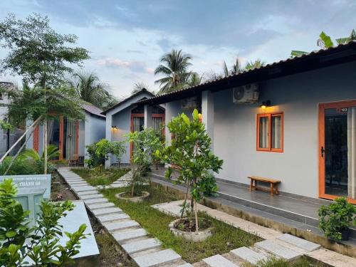 Κήπος έξω από το T-House Homestay Tiền Giang