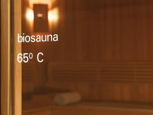 a close up of a glass door with the words bloxania on it at Schwarzer Adler Kitzbühel - Adults Only in Kitzbühel