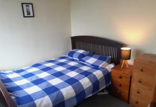 Ένα ή περισσότερα κρεβάτια σε δωμάτιο στο The Yellow Brick House