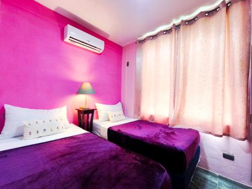 Ένα ή περισσότερα κρεβάτια σε δωμάτιο στο Santana Lux