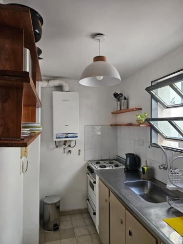 Kuchyň nebo kuchyňský kout v ubytování Luminoso departamento