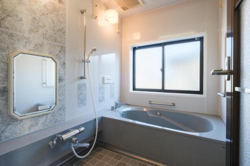 Koupelna v ubytování Snow base Iiyama