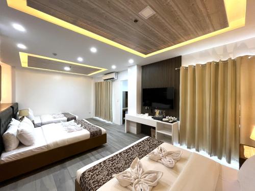 Postel nebo postele na pokoji v ubytování LDR Travellers Inn