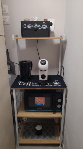 a microwave sitting on top of a table at La Ponzianina in Spoleto