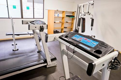 a machine in a room with a treadmill at Caitá Hotéis in Concordia