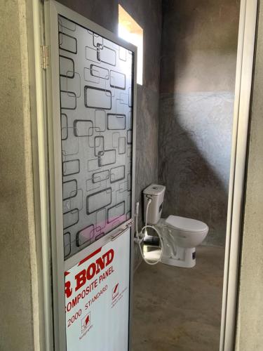 Ένα μπάνιο στο Hideout Madawalalanda