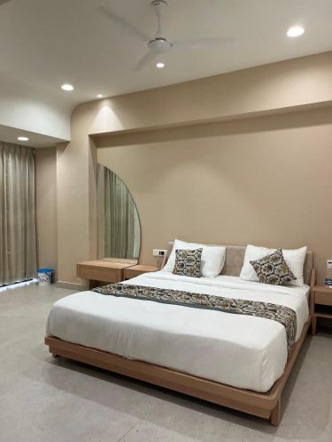 Ένα ή περισσότερα κρεβάτια σε δωμάτιο στο Hotel Sun Shine