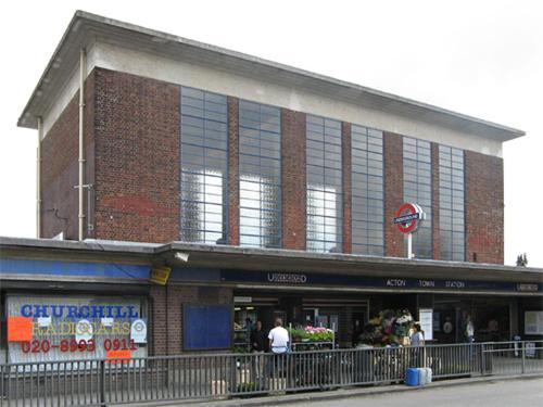 a large brick building with people standing outside of it at Jaffas Loft Room in London