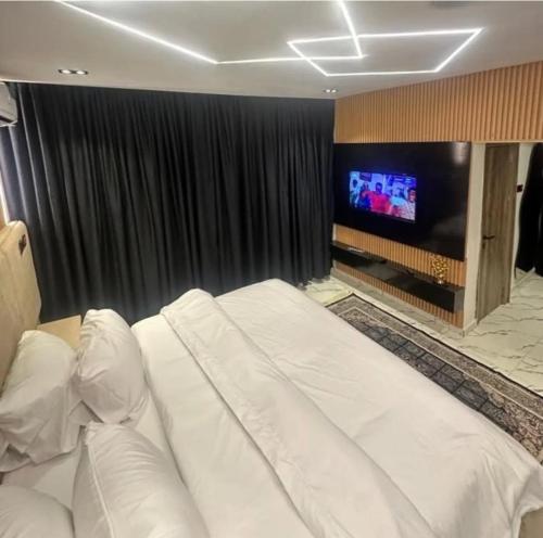 TV a/nebo společenská místnost v ubytování Hometime wuse ll