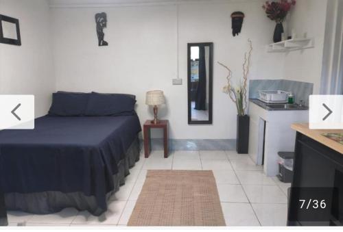 Postel nebo postele na pokoji v ubytování Montego Bay Guesthouse