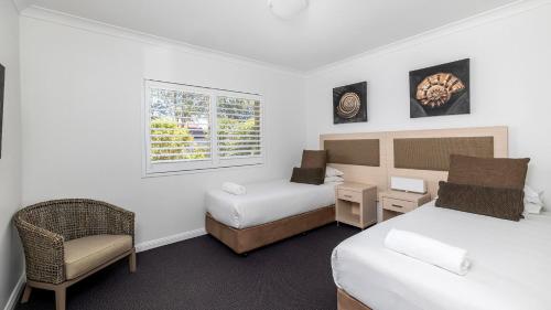 Ένα ή περισσότερα κρεβάτια σε δωμάτιο στο Oaks Pacific Blue Pool spa more in complex