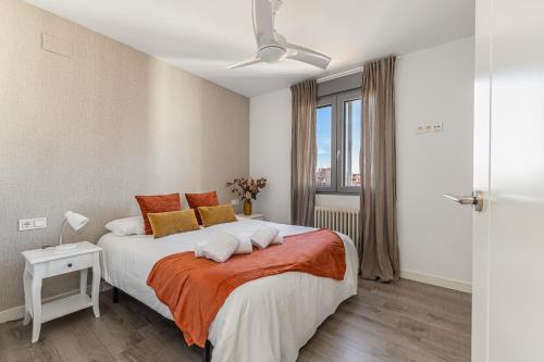 En eller flere senge i et værelse på Waou Living Albacete