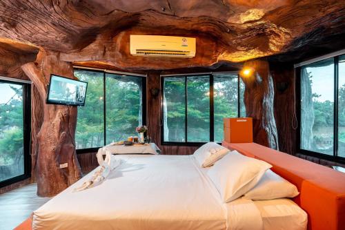 Postel nebo postele na pokoji v ubytování 19 Degrees Resort