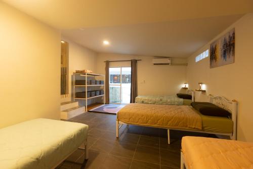 Postel nebo postele na pokoji v ubytování Via del Mare Residence