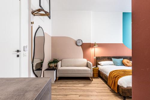 Postel nebo postele na pokoji v ubytování MARS SUITE Style & Relax Centro Livorno