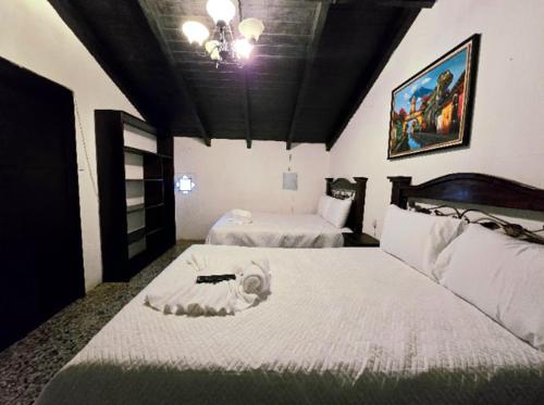 Ένα ή περισσότερα κρεβάτια σε δωμάτιο στο Casa de la Torre