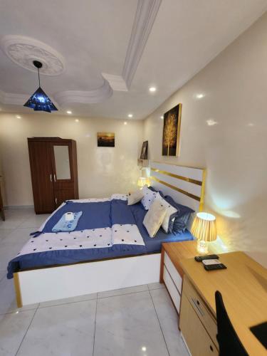 Postel nebo postele na pokoji v ubytování SWEETY ABDOU house