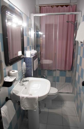 a bathroom with a sink and a shower at Hotel Letizia in Orte