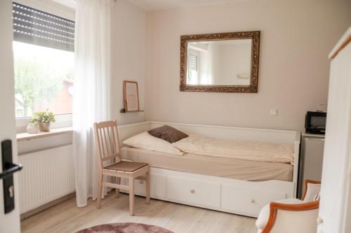Ένα ή περισσότερα κρεβάτια σε δωμάτιο στο Ferienwohnung Kleine Auszeit