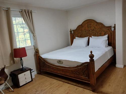 Postel nebo postele na pokoji v ubytování Park Vill 202