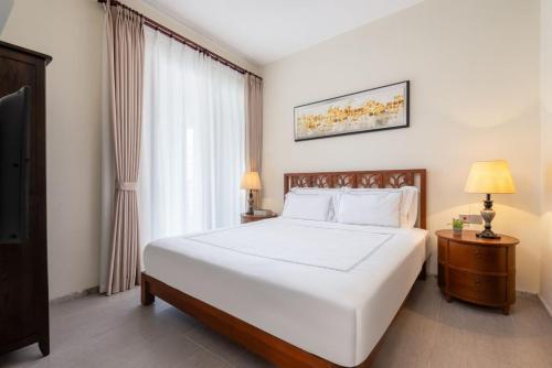 Postel nebo postele na pokoji v ubytování 来咖海景民宿酒店陵水清水湾阿罗哈店