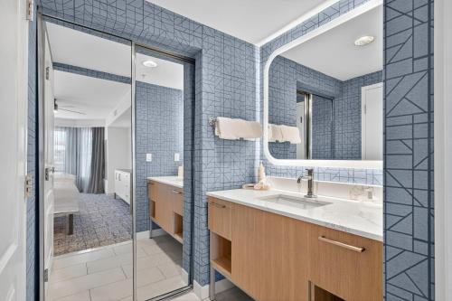 a bathroom with a sink and a mirror at Homewood Suites by Hilton Carlsbad-North San Diego County in Carlsbad