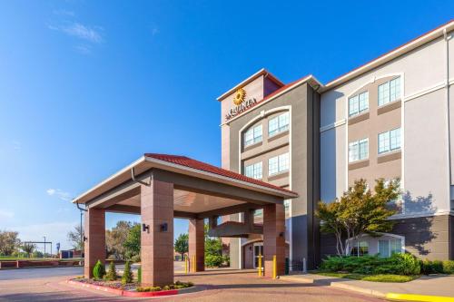 a rendering of a hotel with a gazebo at La Quinta by Wyndham Oklahoma City - Moore in Moore
