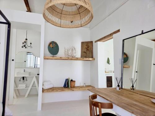 a dining room with a table and a mirror at Stay at Richmond in Richmond