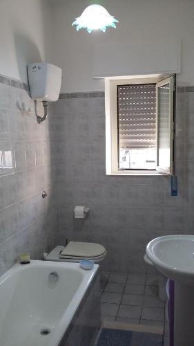 Koupelna v ubytování La Casa sul Corso